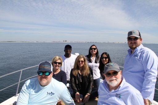 Parrot Head Yachts and SBDC team on boat for success story filming