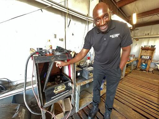 Battery Guyz owner Al Reed in Pensacola shows how their battery recycling business works