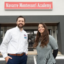 Florida SBDC at UWF Assistant Director John Emsing and client Kiani Richardson who owns and runs Navarre Montessori Academy