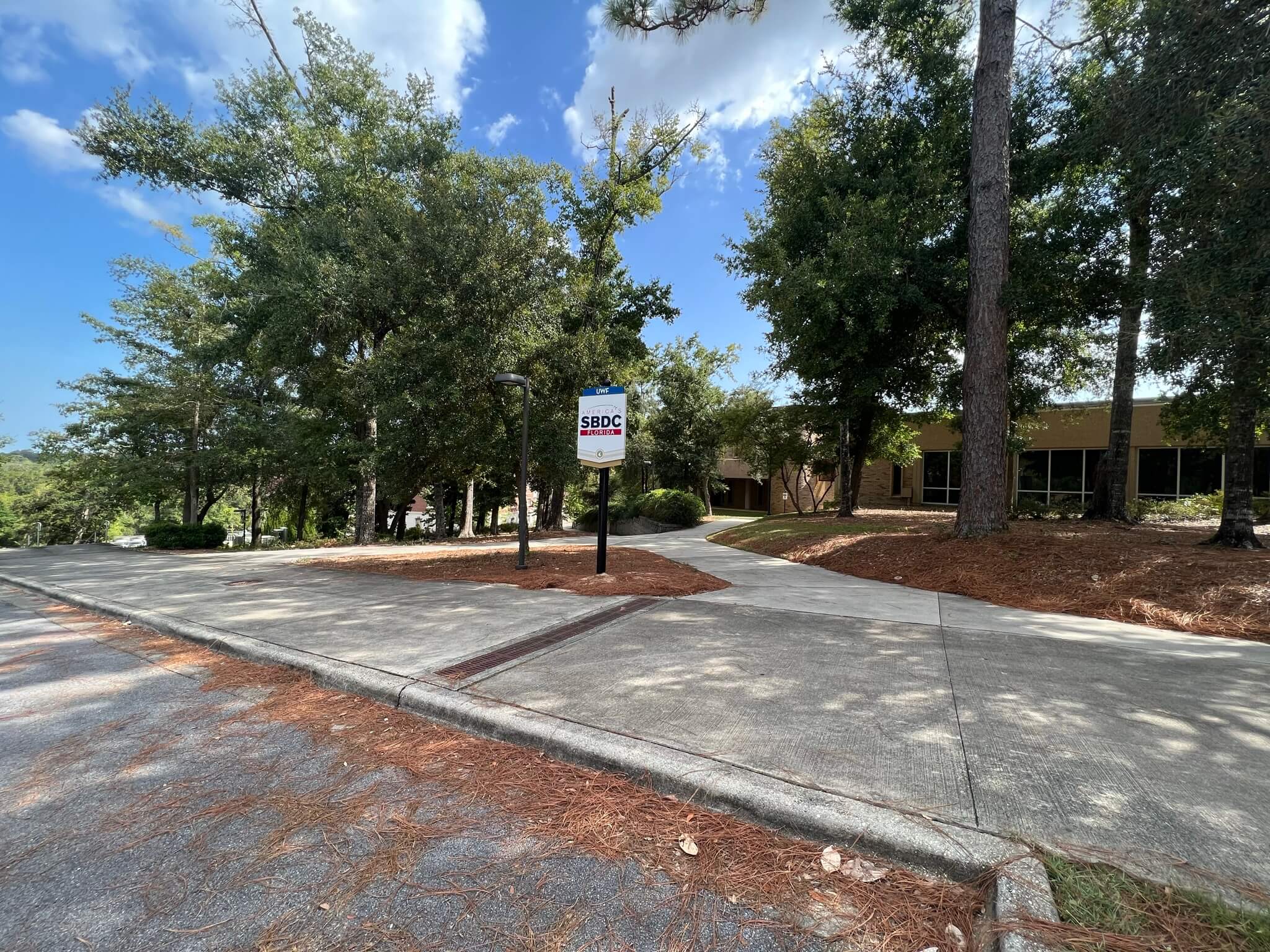 Florida SBDC at UWF Pensacola campus main office sign and building