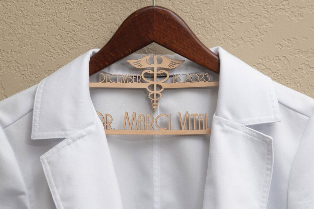 Dr. Marci Vitali's lab coat on her custom hanger