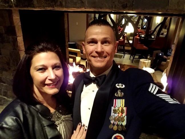 Bob Woodin in uniform and his wife, Lisa, in 2018 at his Air Force retirement ceremony