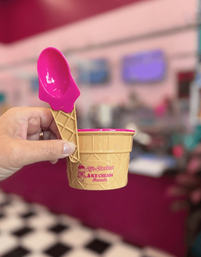 AJ's Market & Ice Cream branded cup and spoon.